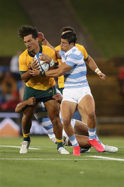 NEWCASTLE, AUSTRALIA - NOVEMBER 21: Jordan Petaia of the Wallabies is tackled during the 2020 Tri-Nations match between the Australian Wallabies and the Argentina Pumas at McDonald Jones Stadium on November 21, 2020 in Newcastle, Australia. (Photo by Mark Metcalfe/Getty Images)