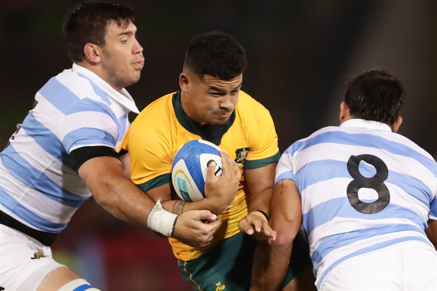 NEWCASTLE, AUSTRALIA - NOVEMBER 21: Hunter Paisami of the Wallabies is tackled during the 2020 Tri-Nations match between the Australian Wallabies and the Argentina Pumas at McDonald Jones Stadium on November 21, 2020 in Newcastle, Australia. (Photo by Mark Metcalfe/Getty Images)
