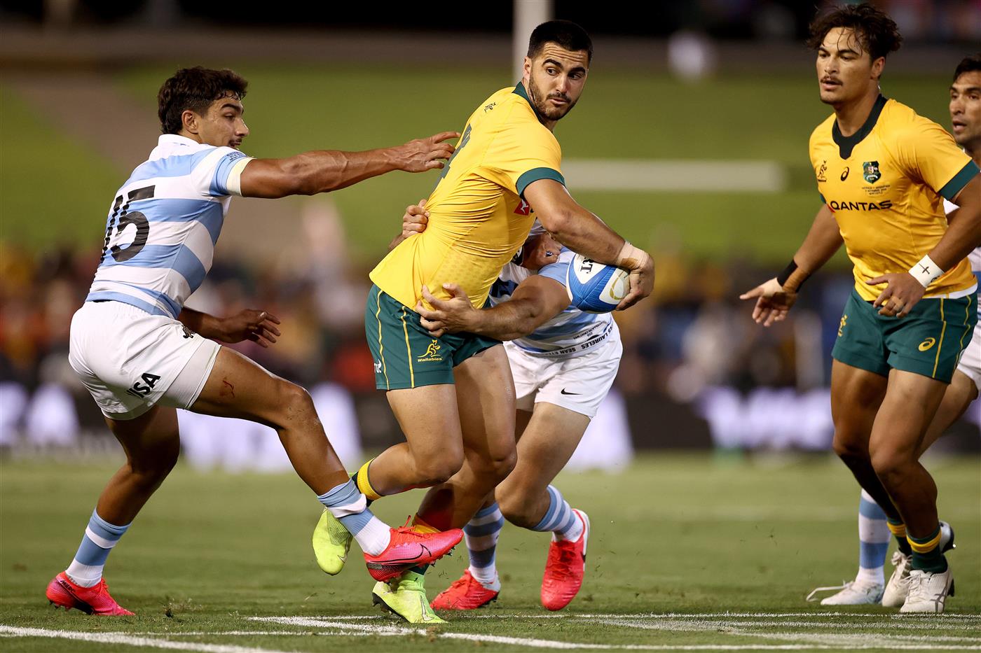 NEWCASTLE, AUSTRALIA - NOVEMBER 21: Tom Wright of Australia is tackled during the 2020 Tri-Nations match between the Australian Wallabies and the Argentina Pumas at McDonald Jones Stadium on November 21, 2020 in Newcastle, Australia. (Photo by Cameron Spencer/Getty Images)
