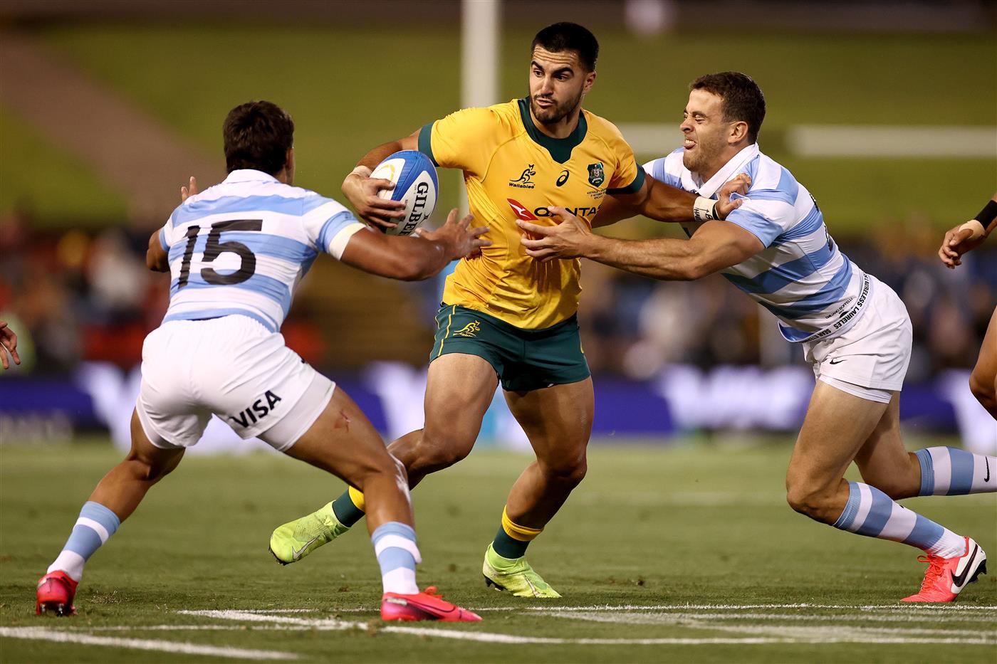 NEWCASTLE, AUSTRALIA - NOVEMBER 21: Tom Wright of Australia is tackled during the 2020 Tri-Nations match between the Australian Wallabies and the Argentina Pumas at McDonald Jones Stadium on November 21, 2020 in Newcastle, Australia. (Photo by Cameron Spencer/Getty Images)