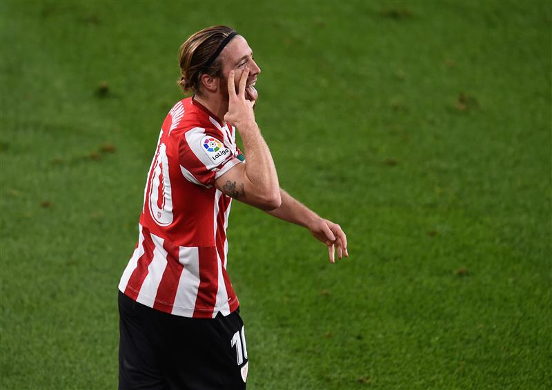 BILBAO, SPAIN - OCTOBER 31: Iker Muniain of Athletic Bilbao celebrates after he scores his sides first goal during the La Liga Santander match between Athletic Club and Sevilla FC at Estadio de San Mames on October 31, 2020 in Bilbao, Spain. Sporting stadiums around Spain remain under strict restrictions due to the Coronavirus Pandemic as Government social distancing laws prohibit fans inside venues resulting in games being played behind closed doors. (Photo by Juan Manuel Serrano Arce/Getty Images)