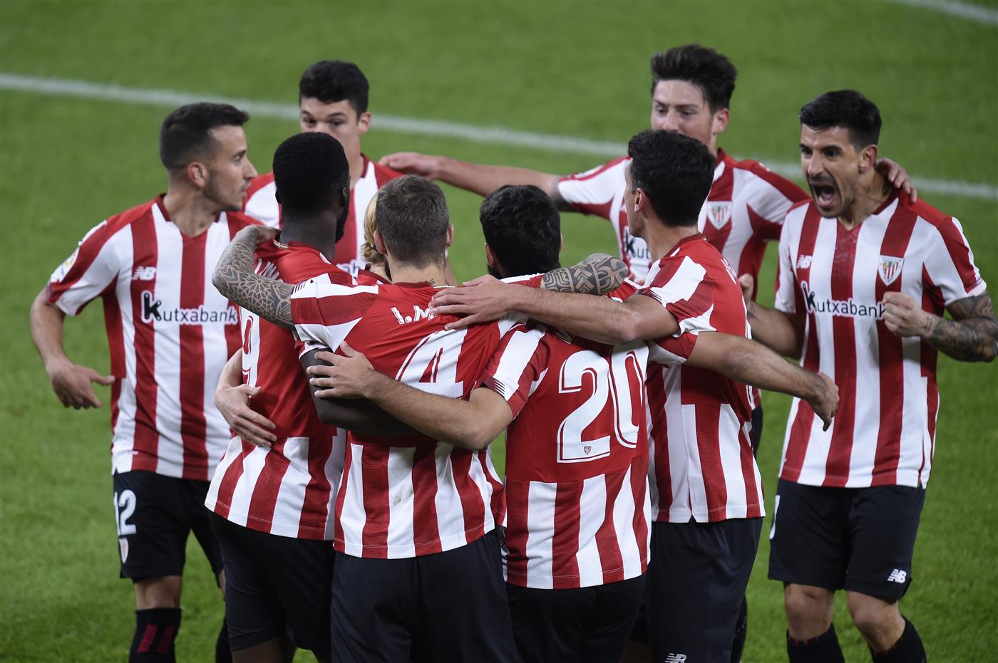 BILBAO, SPAIN - NOVEMBER 23: Inaki Williams, Inigo Martinez and Asier Villalibre of Athletic Bilbao celebrate their first goal which came through a Victor Ruiz of Real Betis (not pictured) own goal during the La Liga Santander match between Athletic Club and Real Betis at Estadio de San Mames on November 23, 2020 in Bilbao, Spain. Sporting stadiums around Spain remain under strict restrictions due to the Coronavirus Pandemic as Government social distancing laws prohibit fans inside venues resulting in games being played behind closed doors. (Photo by Juan Manuel Serrano Arce/Getty Images)