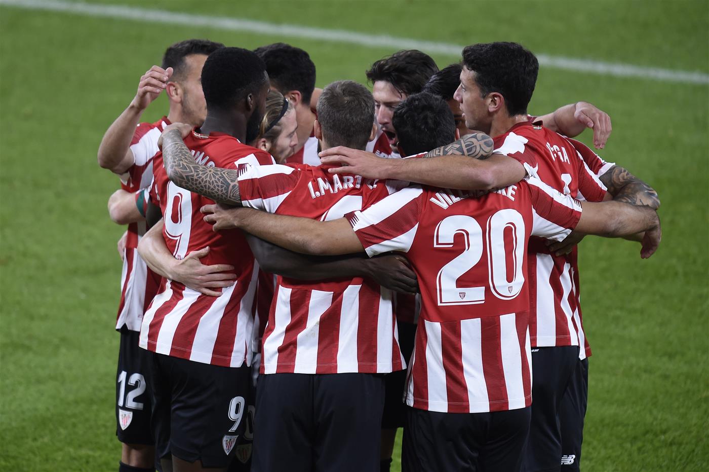 BILBAO, SPAIN - NOVEMBER 23: Inaki Williams, Inigo Martinez and Asier Villalibre of Athletic Bilbao celebrate their first goal which came through a Victor Ruiz of Real Betis (not pictured) own goal during the La Liga Santander match between Athletic Club and Real Betis at Estadio de San Mames on November 23, 2020 in Bilbao, Spain. Sporting stadiums around Spain remain under strict restrictions due to the Coronavirus Pandemic as Government social distancing laws prohibit fans inside venues resulting in games being played behind closed doors. (Photo by Juan Manuel Serrano Arce/Getty Images)