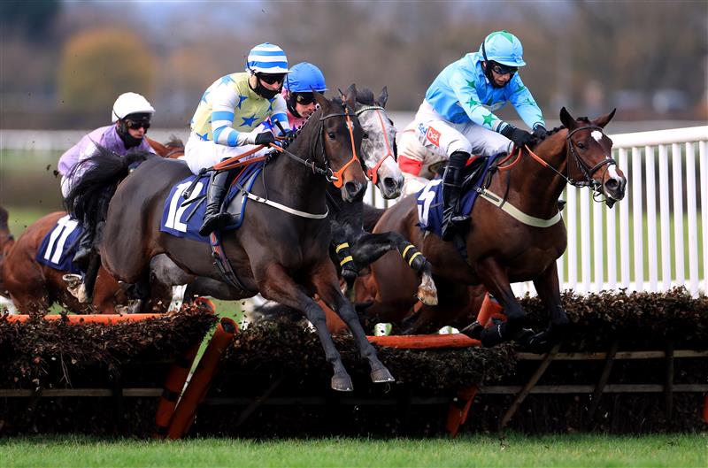 WETHERBY, UNITED KINGDOM - NOVEMBER 25: Miracle Eagle ridden by jockey Joe Colliver (left) and Numberoneson ridden by jockey Daryl Jacob (right) clear a fence during the wetherbyracing.co.uk Juvenile Maiden Hurdle (Northern Lights Juvenile Series Qualifier) (GBB Race) at Wetherby Racecourse on November 25, 2020 in Wetherby, England. (Photo by Mike Egerton - Pool/Getty Images)