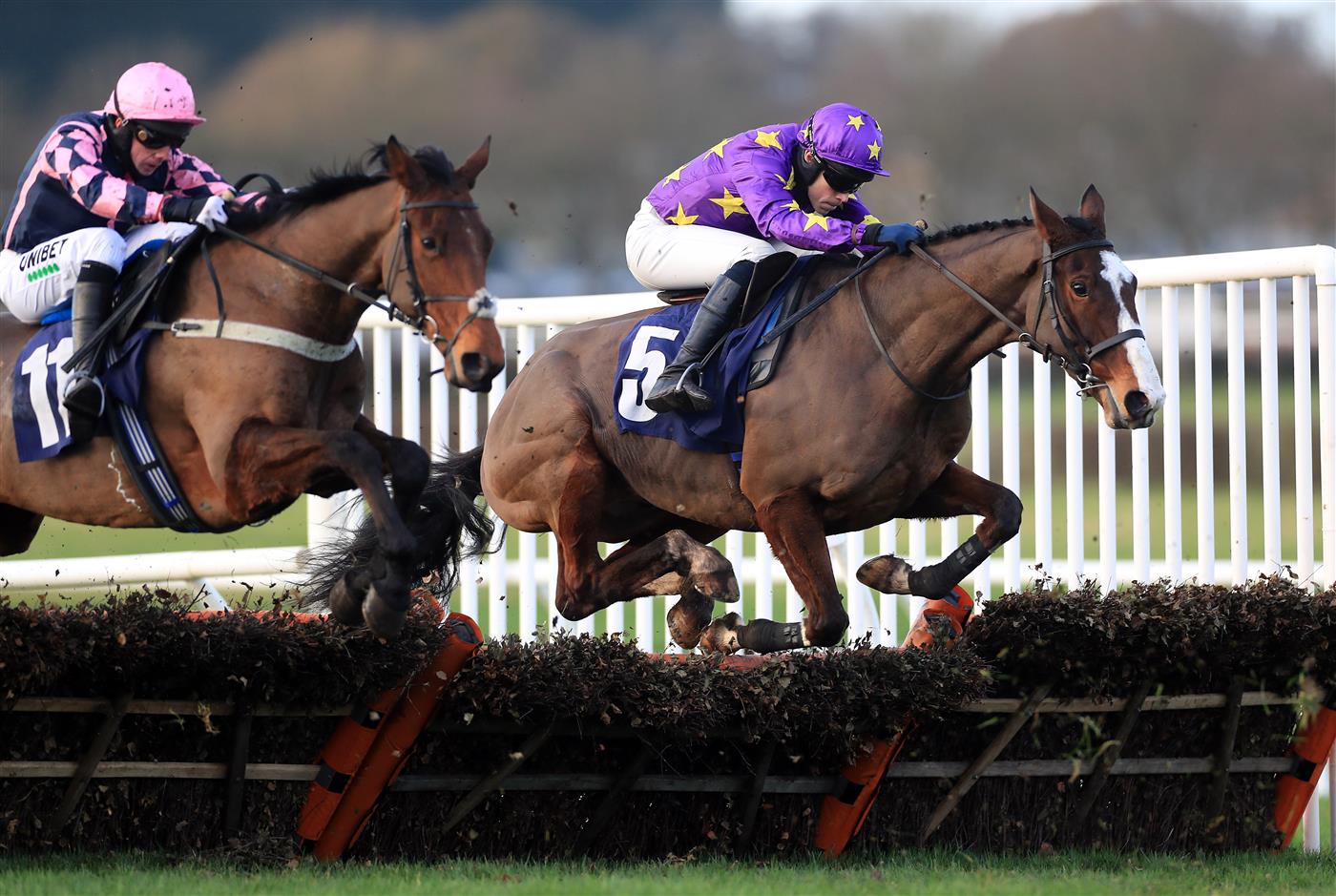 WETHERBY, UNITED KINGDOM - NOVEMBER 25: Abington Park ridden by jockey Thomas Dowson clear a fence during the Follow @racingtv On Twitter Novices' Hurdle (GBB Race) at Wetherby Racecourse on November 25, 2020 in Wetherby, England. (Photo by Mike Egerton - Pool/Getty Images)