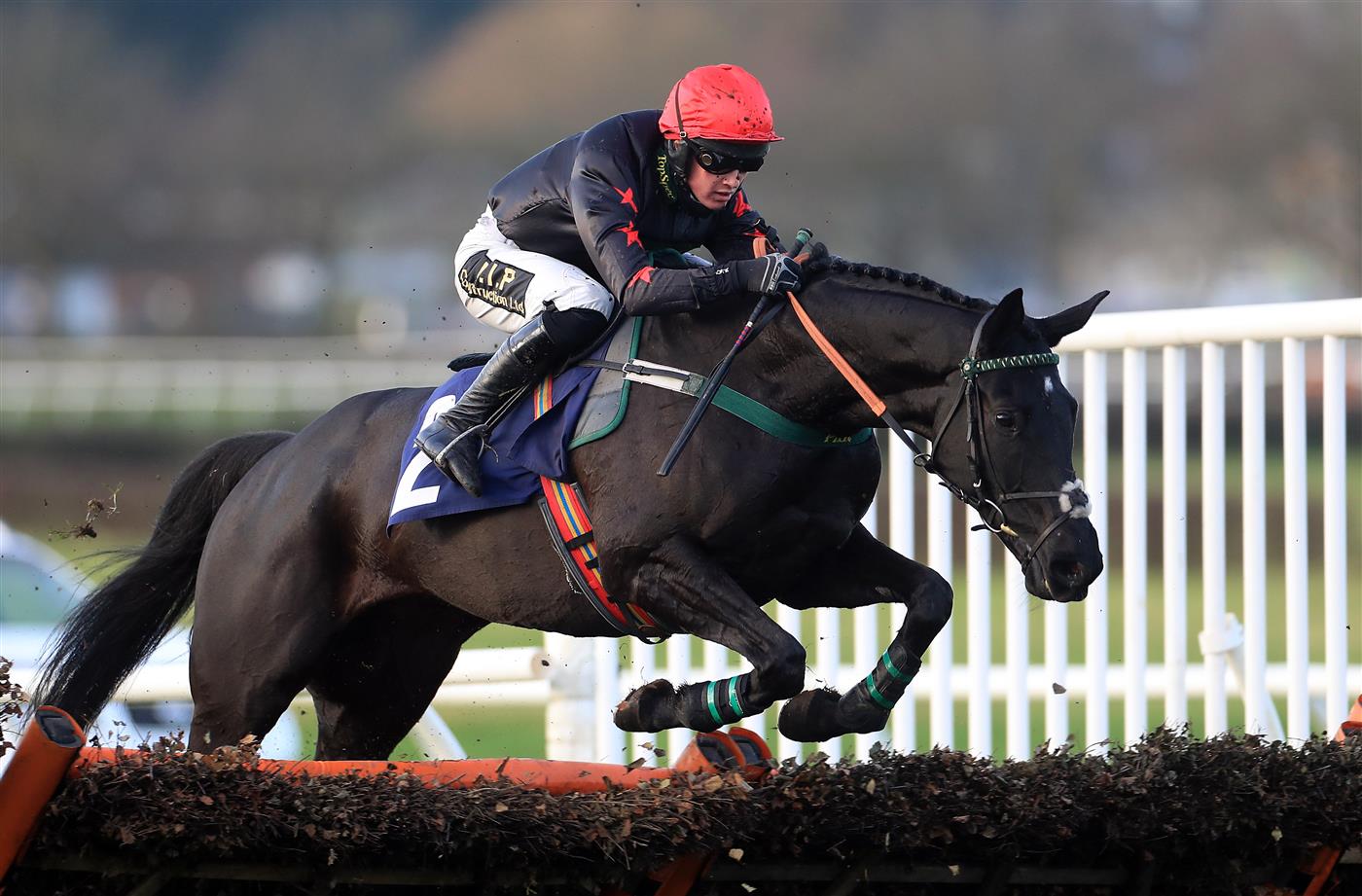 WETHERBY, UNITED KINGDOM - NOVEMBER 25: Abington Park ridden by jockey Thomas Dowson clear a fence during the Follow @racingtv On Twitter Novices' Hurdle (GBB Race) at Wetherby Racecourse on November 25, 2020 in Wetherby, England. (Photo by Mike Egerton - Pool/Getty Images)