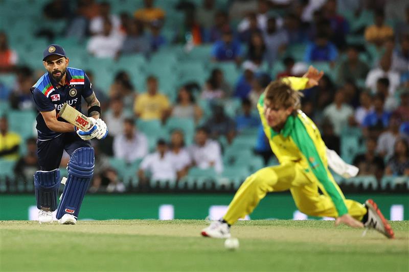 SYDNEY, AUSTRALIA - NOVEMBER 29: Virat Kohli of India plays a shot past Adam Zampa of Australia during game two of the One Day International series between Australia and India at Sydney Cricket Ground on November 29, 2020 in Sydney, Australia. (Photo by Cameron Spencer/Getty Images)