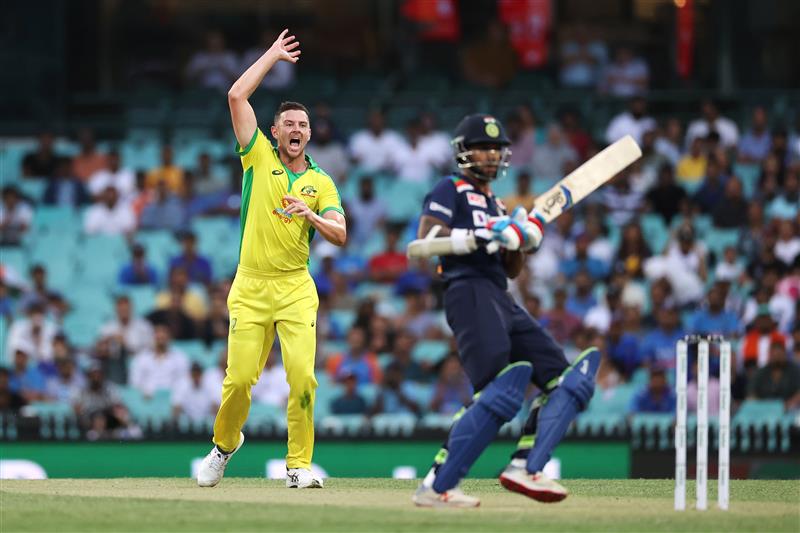 SYDNEY, AUSTRALIA - NOVEMBER 29: Josh Hazlewood of Australia reacts after bowling a delivery during game two of the One Day International series between Australia and India at Sydney Cricket Ground on November 29, 2020 in Sydney, Australia. (Photo by Cameron Spencer/Getty Images)