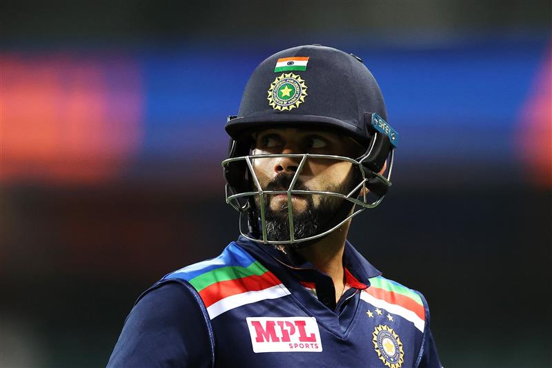 SYDNEY, AUSTRALIA - NOVEMBER 29: Virat Kohli of India leaves the field after being dismissed by Josh Hazlewood of Australia during game two of the One Day International series between Australia and India at Sydney Cricket Ground on November 29, 2020 in Sydney, Australia. (Photo by Cameron Spencer/Getty Images)