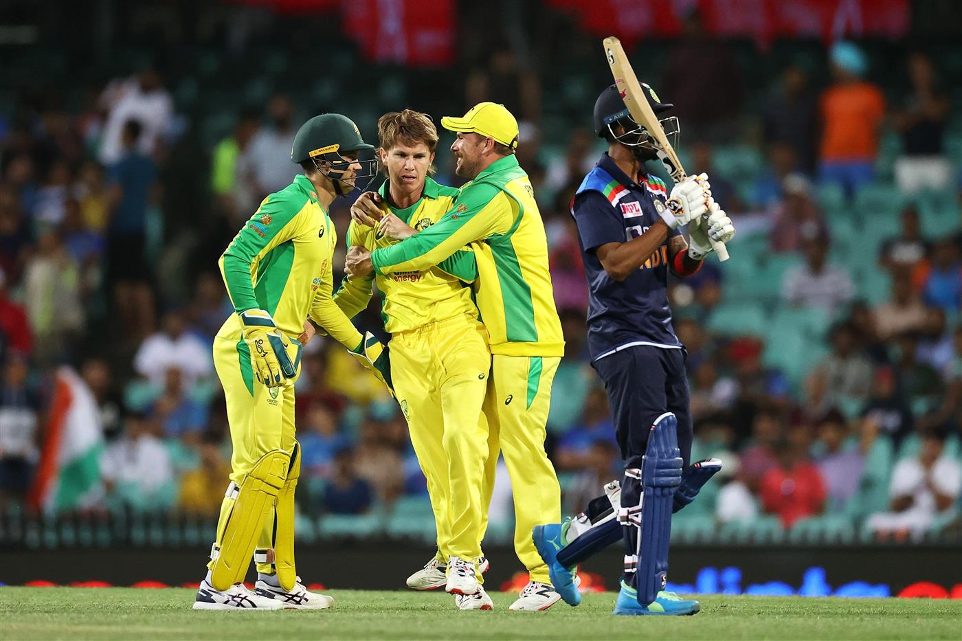 SYDNEY, AUSTRALIA - NOVEMBER 29: Aaron Finch of Australia congratulates Adam Zampa of Australia after dismissing KL Rahul of India during game two of the One Day International series between Australia and India at Sydney Cricket Ground on November 29, 2020 in Sydney, Australia. (Photo by Cameron Spencer/Getty Images)