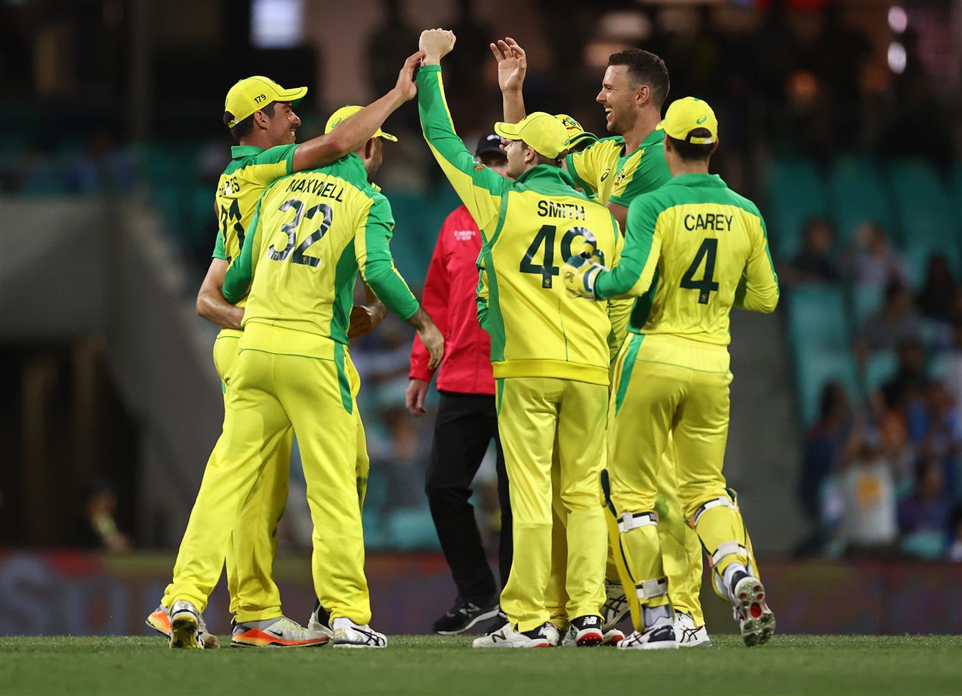 SYDNEY, AUSTRALIA - NOVEMBER 29: Josh Hazlewood of Australia and Moises Henriques of Australia celebrates after combining to take the wicket of Virat Kohli of India during game two of the One Day International series between Australia and India at Sydney Cricket Ground on November 29, 2020 in Sydney, Australia. (Photo by Ryan Pierse/Getty Images)