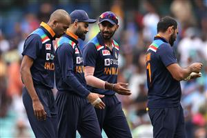 SYDNEY, AUSTRALIA - NOVEMBER 29: Virat Kohli and his Indian team mates walk off the field during game two of the One Day International series between Australia and India at Sydney Cricket Ground on November 29, 2020 in Sydney, Australia. (Photo by Cameron Spencer/Getty Images)