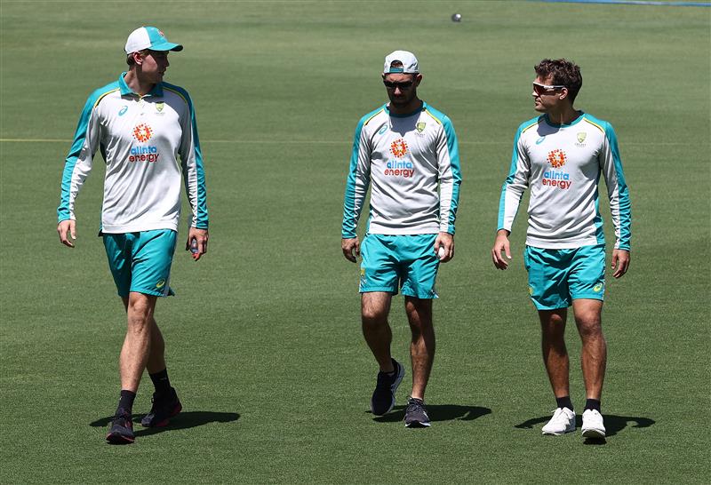 CANBERRA, AUSTRALIA - DECEMBER 01: Cameron Green,  Glenn Maxwell and Alex Carey of Australia look on during an Australian ODI nets session at Manuka Oval on December 01, 2020 in Canberra, Australia. (Photo by Ryan Pierse/Getty Images)
