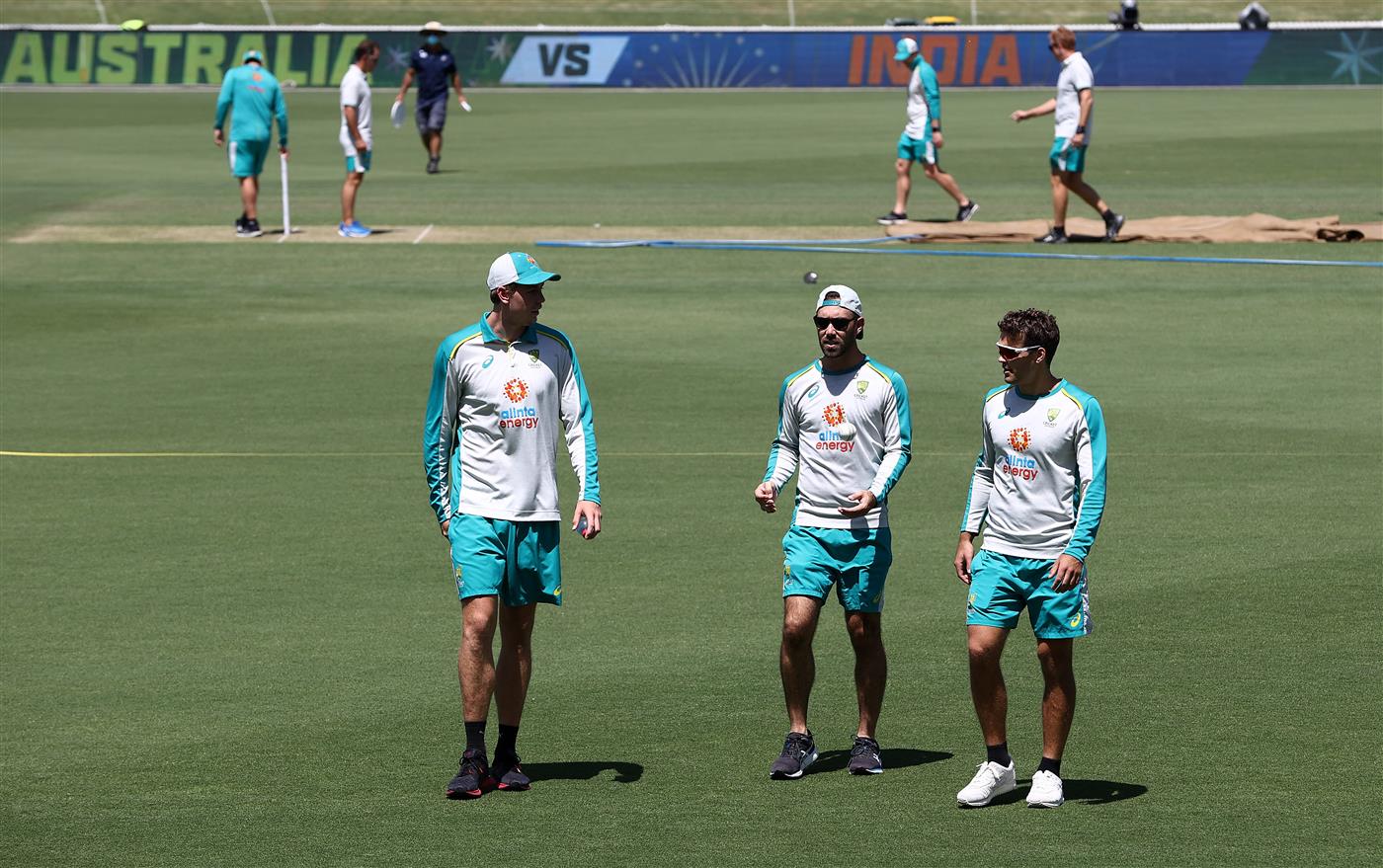 CANBERRA, AUSTRALIA - DECEMBER 01: Cameron Green,  Glenn Maxwell and Alex Carey of Australia look on during an Australian ODI nets session at Manuka Oval on December 01, 2020 in Canberra, Australia. (Photo by Ryan Pierse/Getty Images)