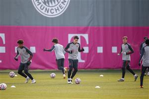 MUNICH, GERMANY - NOVEMBER 30: In this handout image provided by FC Bayern Muenchen Chris Richards (L) and Marc Roca (C) control the ball during a training session a day before the UEFA Champions League Group A stage match between FC Bayern Muenchen and Atletico Madrid at Saebener Strasse training ground on November 30, 2020 in Munich, Germany. (Photo by Handout/FC Bayern via Getty Images)