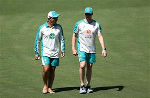 CANBERRA, AUSTRALIA - DECEMBER 01: Justin Langer, coach of Australia,  speaks to Steve Smith of Australia during an Australian ODI nets session at Manuka Oval on December 01, 2020 in Canberra, Australia. (Photo by Ryan Pierse/Getty Images)