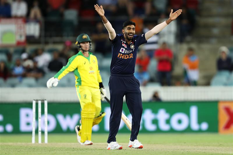 CANBERRA, AUSTRALIA - DECEMBER 02: Jasprit Bumrah of India successfully appeasls for the wicket of Adam Zampa of Australia to claim victory for India during game three of the One Day International series between Australia and India at Manuka Oval on December 02, 2020 in Canberra, Australia. (Photo by Mark Kolbe/Getty Images)