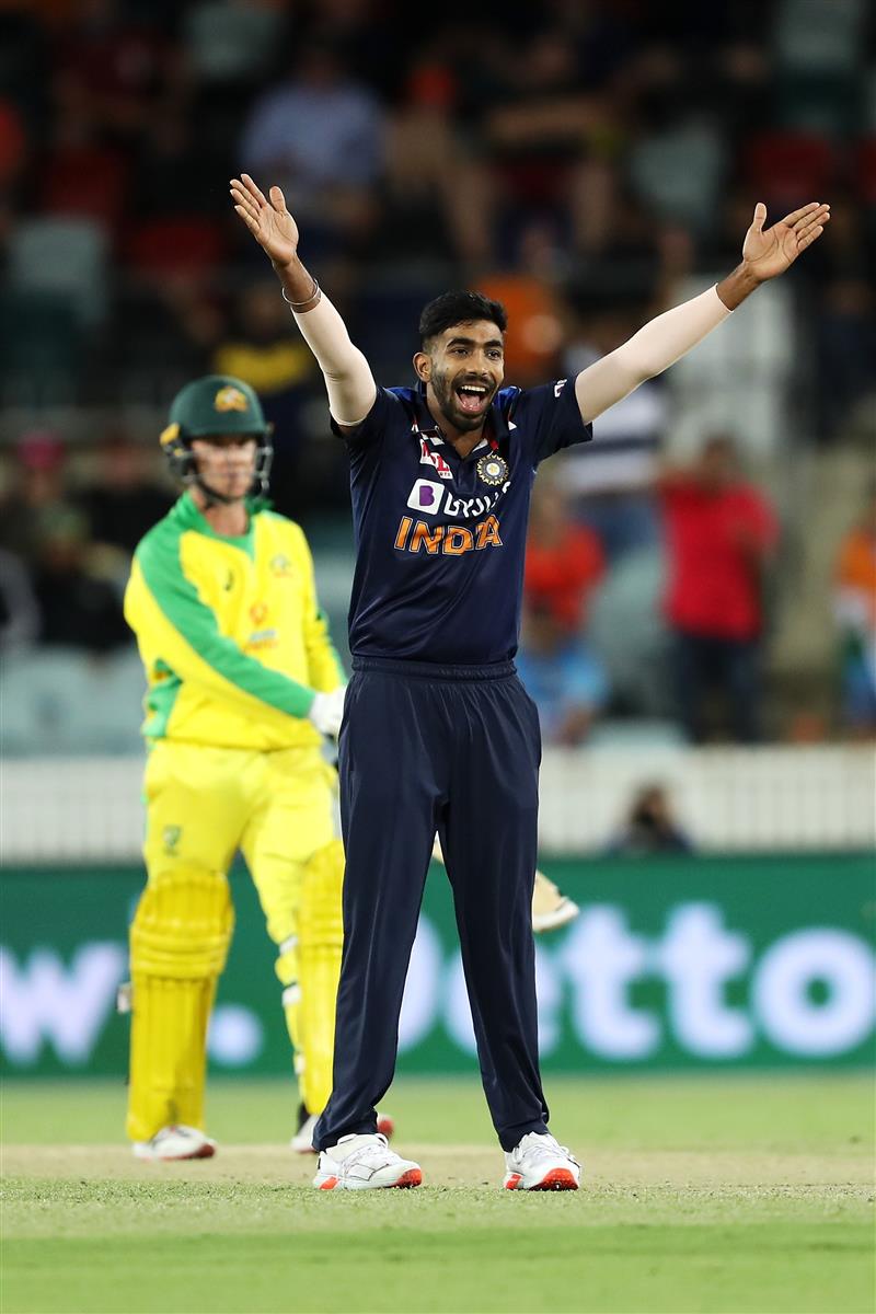 CANBERRA, AUSTRALIA - DECEMBER 02: Jasprit Bumrah of India successfully appeasls for the wicket of Adam Zampa of Australia to claim victory for India during game three of the One Day International series between Australia and India at Manuka Oval on December 02, 2020 in Canberra, Australia. (Photo by Mark Kolbe/Getty Images)