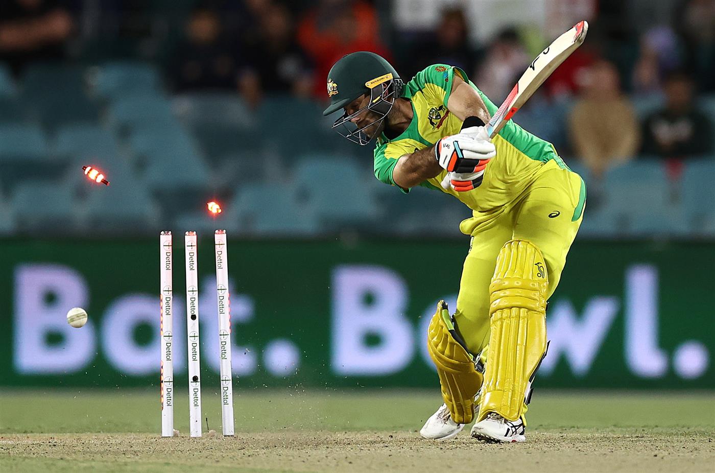 CANBERRA, AUSTRALIA - DECEMBER 02: Glenn Maxwell of Australia is bowled by Jasprit Bumrah of Indiaduring game three of the One Day International series between Australia and India at Manuka Oval on December 02, 2020 in Canberra, Australia. (Photo by Ryan Pierse/Getty Images)