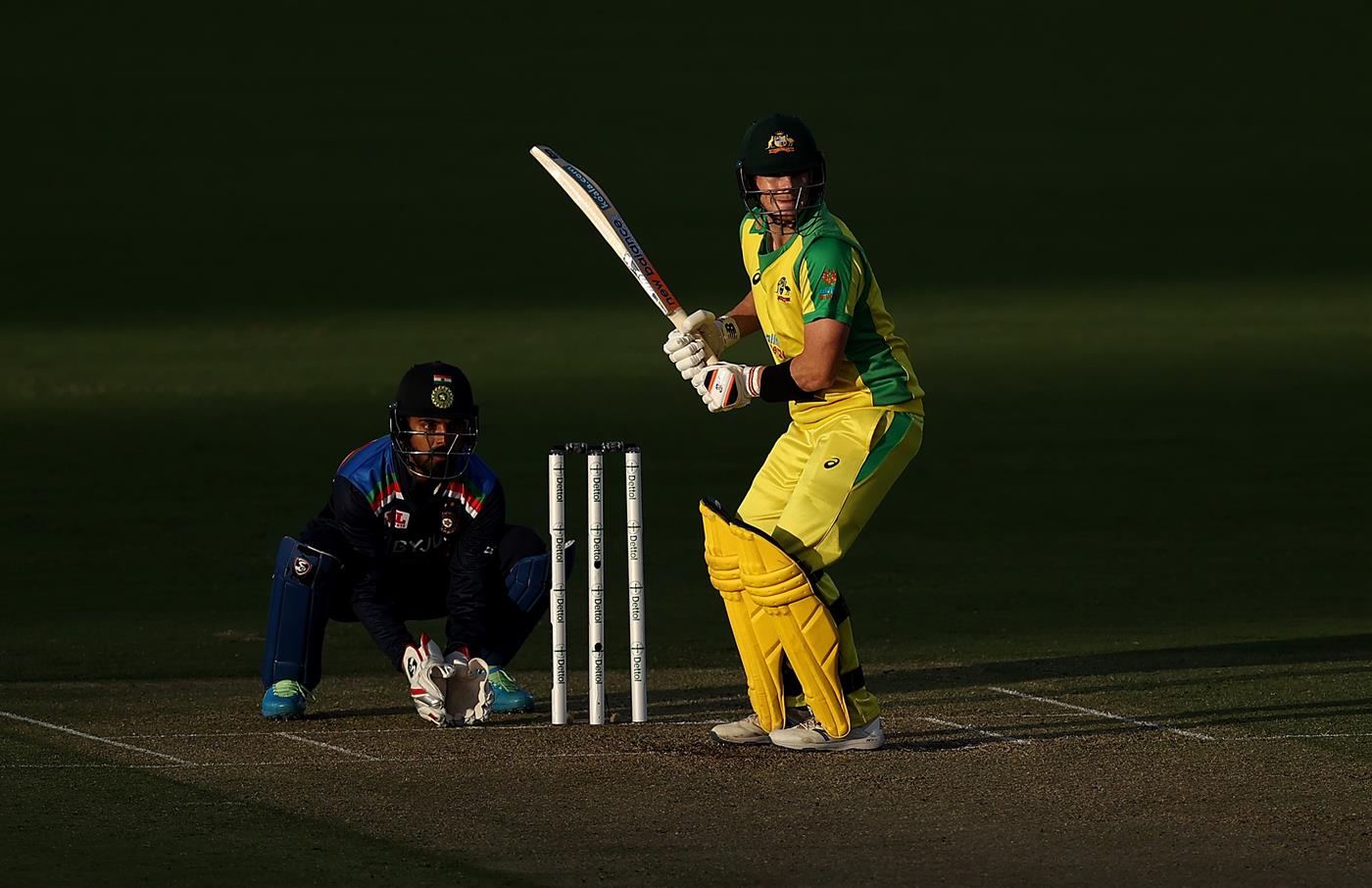 CANBERRA, AUSTRALIA - DECEMBER 02: Steve Smith of Australia bats as KL Rahul of India keeps wicket during game three of the One Day International series between Australia and India at Manuka Oval on December 02, 2020 in Canberra, Australia. (Photo by Ryan Pierse/Getty Images)