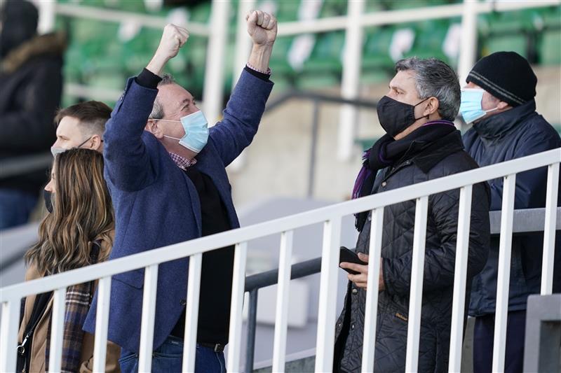 ESHER, ENGLAND - DECEMBER 05: A racegoer celebrates a winner at Sandown Park on December 05, 2020 in Esher, England. Owners and a limited number of the public are allowed to attend the meeting due to the Coronavirus pandemic. (Photo by Alan Crowhurst/Getty Images)