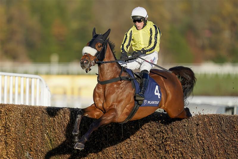 ESHER, ENGLAND - DECEMBER 05: Harry Skelton riding Allmankind clear the last to win The Planteur At Chapel Stud Henry VIII Novices' Chase at Sandown Park on December 05, 2020 in Esher, England. Owners and a limited number of the public are allowed to attend the meeting due to the Coronavirus pandemic. (Photo by Alan Crowhurst/Getty Images)