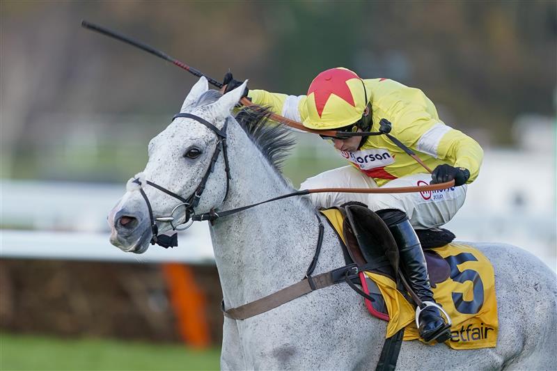 ESHER, ENGLAND - DECEMBER 05: Harry Skelton riding Politologue clear the last to win The Betfair Tingle Creek Chase at Sandown Park on December 05, 2020 in Esher, England. Owners and a limited number of the public are allowed to attend the meeting due to the Coronavirus pandemic. (Photo by Alan Crowhurst/Getty Images)