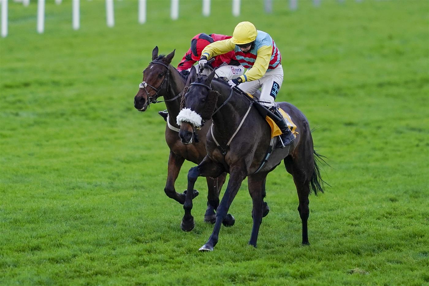 ESHER, ENGLAND - DECEMBER 05: Millie Wonnacott riding Doing Fine (R) clear the last to win The Betfair Exchange Back And Lay London National Handicap Chase at Sandown Park on December 05, 2020 in Esher, England. Owners and a limited number of the public are allowed to attend the meeting due to the Coronavirus pandemic. (Photo by Alan Crowhurst/Getty Images)