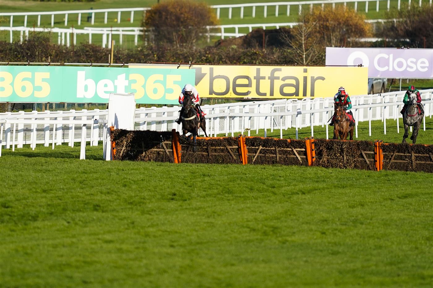 ESHER, ENGLAND - DECEMBER 05: Niall Houlihan riding Fifty Ball clear the last to win The Read Paul Nicholls On betting.betfair Novices' Handicap Hurdle at Sandown Park on December 05, 2020 in Esher, England. Owners and a limited number of the public are allowed to attend the meeting due to the Coronavirus pandemic. (Photo by Alan Crowhurst/Getty Images)