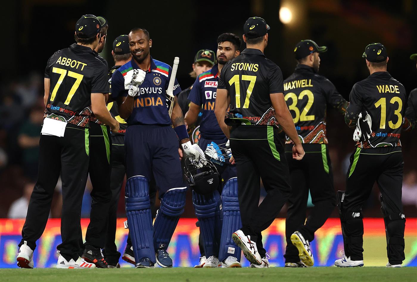 SYDNEY, AUSTRALIA - DECEMBER 06: Hardik Pandya and 
Shreyas Iyer of India are congratulated by the Australian team after winning game two of the Twenty20 International series between Australia and India at Sydney Cricket Ground on December 06, 2020 in Sydney, Australia. (Photo by Ryan Pierse/Getty Images)