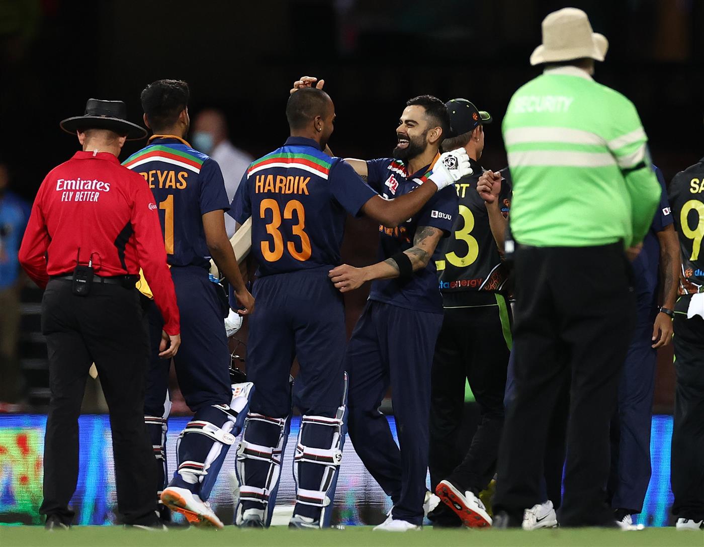 SYDNEY, AUSTRALIA - DECEMBER 06: Hardik Pandya and 
Shreyas Iyer of India are congratulated by Virat Kohli of India after winning game two of the Twenty20 International series between Australia and India at Sydney Cricket Ground on December 06, 2020 in Sydney, Australia. (Photo by Ryan Pierse/Getty Images)
