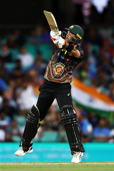 SYDNEY, AUSTRALIA - DECEMBER 08: Glenn Maxwell of Australia bats during game three of the Twenty20 International series between Australia and India at Sydney Cricket Ground on December 08, 2020 in Sydney, Australia. (Photo by Cameron Spencer/Getty Images)