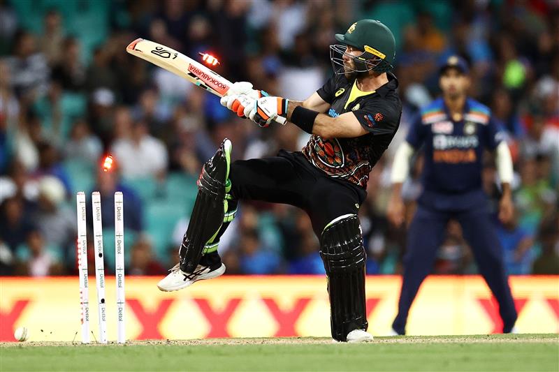 SYDNEY, AUSTRALIA - DECEMBER 08: Glenn Maxwell of Australia is dismissed by Thangarasu Natarajan of India during game three of the Twenty20 International series between Australia and India at Sydney Cricket Ground on December 08, 2020 in Sydney, Australia. (Photo by Cameron Spencer/Getty Images)