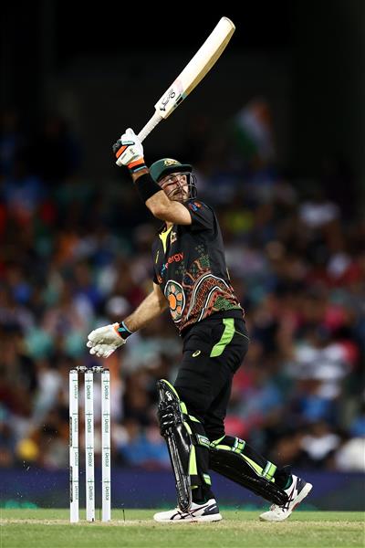 SYDNEY, AUSTRALIA - DECEMBER 08: Glenn Maxwell of Australia bats during game three of the Twenty20 International series between Australia and India at Sydney Cricket Ground on December 08, 2020 in Sydney, Australia. (Photo by Cameron Spencer/Getty Images)