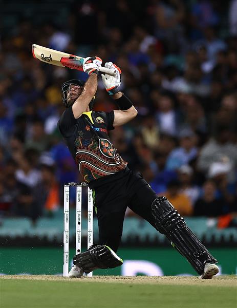 SYDNEY, AUSTRALIA - DECEMBER 08: Glenn Maxwell of Australia bats during game three of the Twenty20 International series between Australia and India at Sydney Cricket Ground on December 08, 2020 in Sydney, Australia. (Photo by Ryan Pierse/Getty Images)