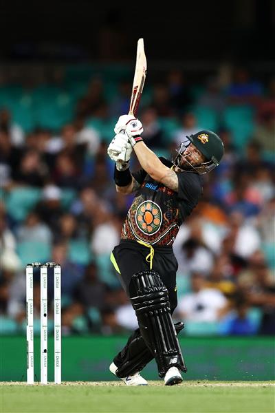 SYDNEY, AUSTRALIA - DECEMBER 08: Matthew Wade of Australia bats during game three of the Twenty20 International series between Australia and India at Sydney Cricket Ground on December 08, 2020 in Sydney, Australia. (Photo by Cameron Spencer/Getty Images)