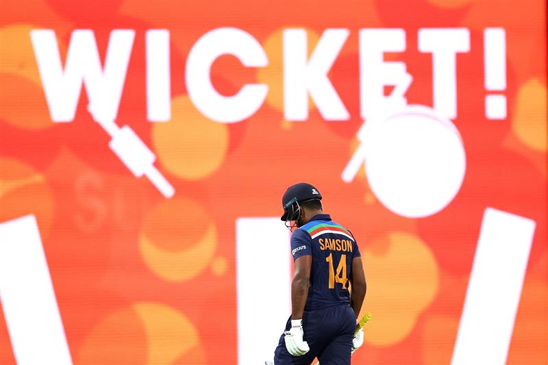 SYDNEY, AUSTRALIA - DECEMBER 08: Sanju Samson of India leaves the field after being dismissed by Mitchell Swepson of Australia during game three of the Twenty20 International series between Australia and India at Sydney Cricket Ground on December 08, 2020 in Sydney, Australia. (Photo by Cameron Spencer/Getty Images)