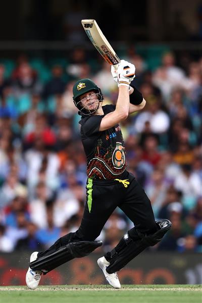 SYDNEY, AUSTRALIA - DECEMBER 08: Steve Smith of Australia bats during game three of the Twenty20 International series between Australia and India at Sydney Cricket Ground on December 08, 2020 in Sydney, Australia. (Photo by Cameron Spencer/Getty Images)