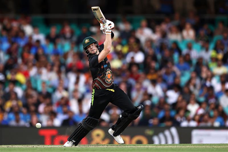 SYDNEY, AUSTRALIA - DECEMBER 08: Steve Smith of Australia bats during game three of the Twenty20 International series between Australia and India at Sydney Cricket Ground on December 08, 2020 in Sydney, Australia. (Photo by Cameron Spencer/Getty Images)