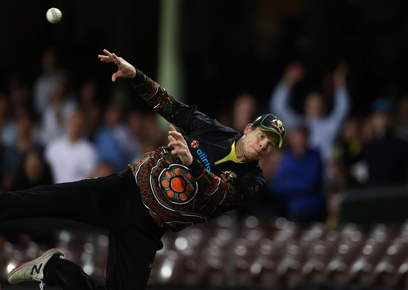 SYDNEY, AUSTRALIA - DECEMBER 08:  Steve Smith of Australia dives to stop a boundary during game three of the Twenty20 International series between Australia and India at Sydney Cricket Ground on December 08, 2020 in Sydney, Australia. (Photo by Ryan Pierse/Getty Images)