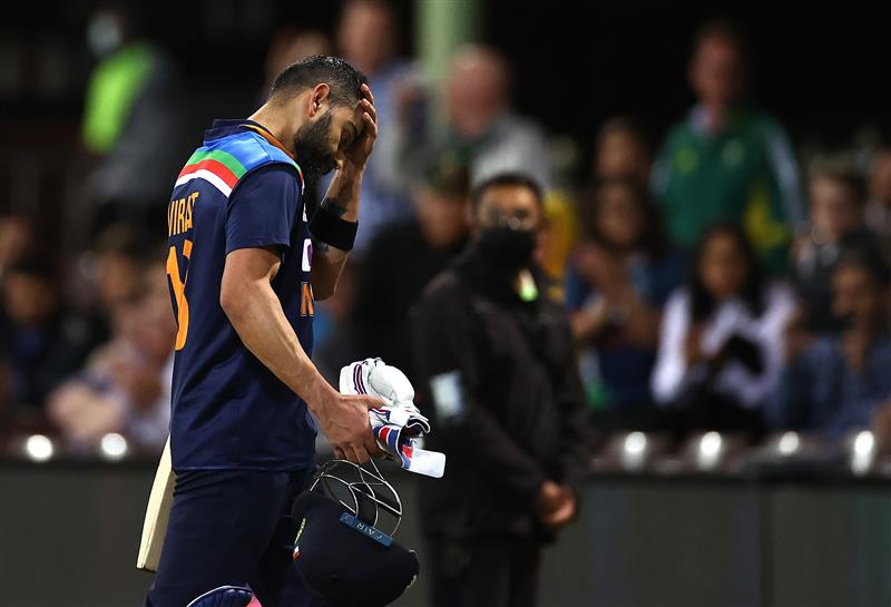SYDNEY, AUSTRALIA - DECEMBER 08: Virat Kohli of India looks dejected after being dismissed by Andrew Tye of Australia during game three of the Twenty20 International series between Australia and India at Sydney Cricket Ground on December 08, 2020 in Sydney, Australia. (Photo by Ryan Pierse/Getty Images)