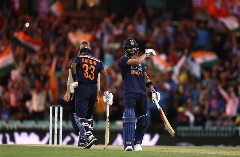 SYDNEY, AUSTRALIA - DECEMBER 08: Virat Kohli of India reacts while batting during game three of the Twenty20 International series between Australia and India at Sydney Cricket Ground on December 08, 2020 in Sydney, Australia. (Photo by Ryan Pierse/Getty Images)