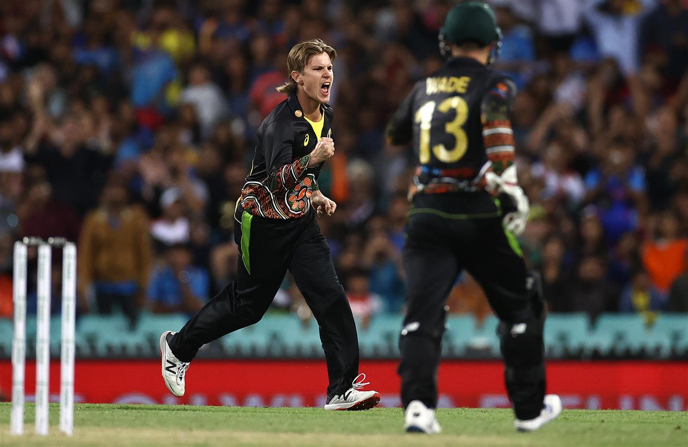 SYDNEY, AUSTRALIA - DECEMBER 08: Adam Zampa of Australia celebrates after taking the wicket of Hardik Pandya of India during game three of the Twenty20 International series between Australia and India at Sydney Cricket Ground on December 08, 2020 in Sydney, Australia. (Photo by Ryan Pierse/Getty Images)