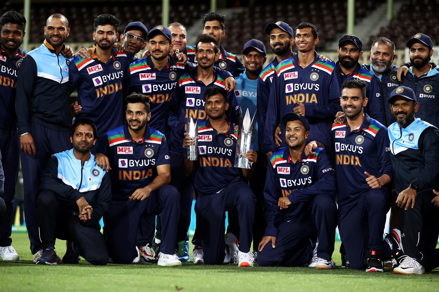 SYDNEY, AUSTRALIA - DECEMBER 08: India pose with the T20 trophy following game three of the Twenty20 International series between Australia and India at Sydney Cricket Ground on December 08, 2020 in Sydney, Australia. (Photo by Cameron Spencer/Getty Images)