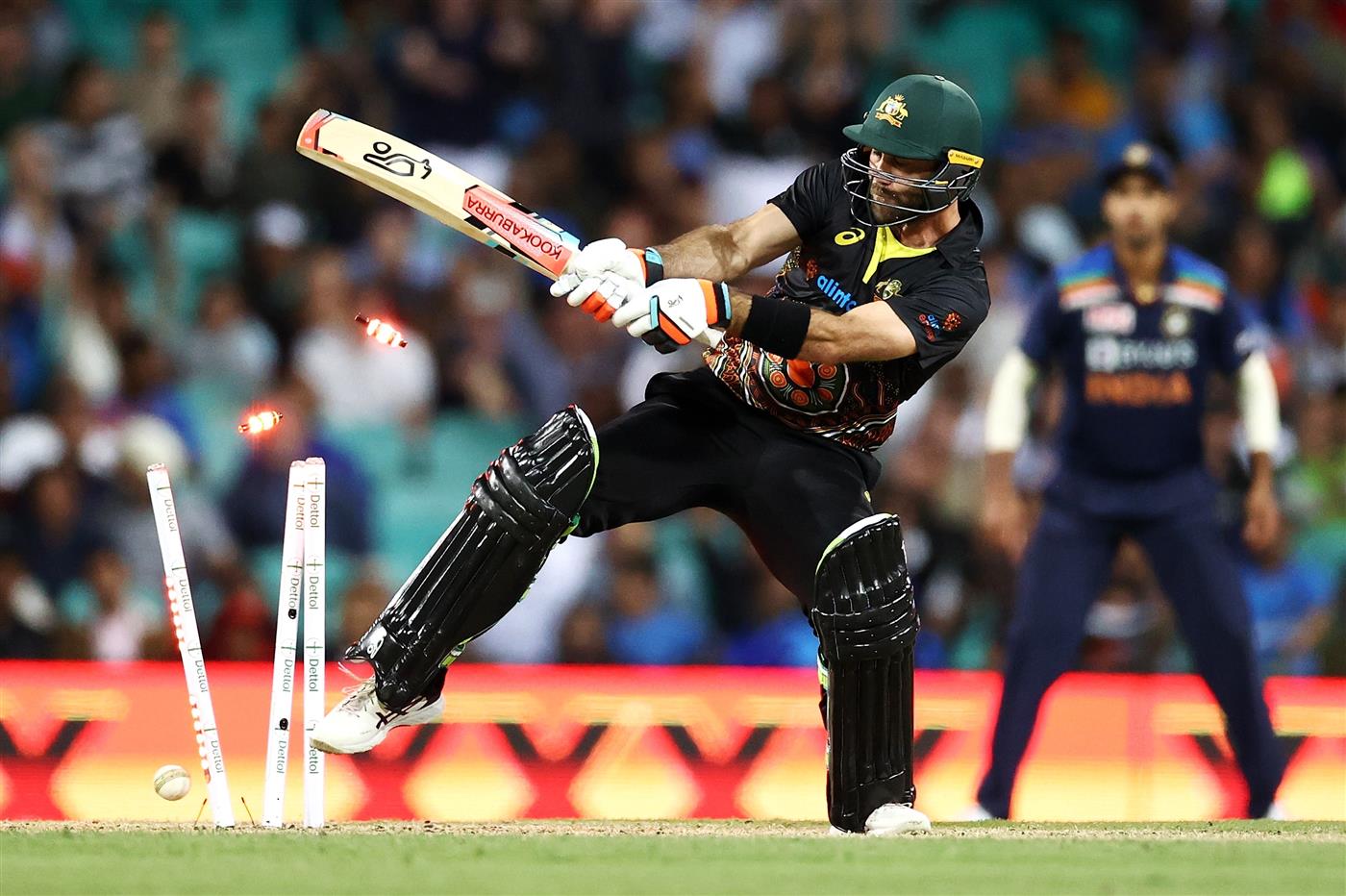 SYDNEY, AUSTRALIA - DECEMBER 08: Glenn Maxwell of Australia is dismissed by Thangarasu Natarajan of India during game three of the Twenty20 International series between Australia and India at Sydney Cricket Ground on December 08, 2020 in Sydney, Australia. (Photo by Cameron Spencer/Getty Images)