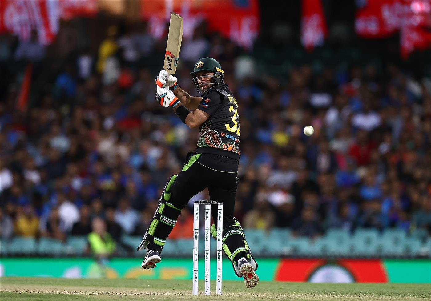SYDNEY, AUSTRALIA - DECEMBER 08: Glenn Maxwell of Australia bats during game three of the Twenty20 International series between Australia and India at Sydney Cricket Ground on December 08, 2020 in Sydney, Australia. (Photo by Ryan Pierse/Getty Images)