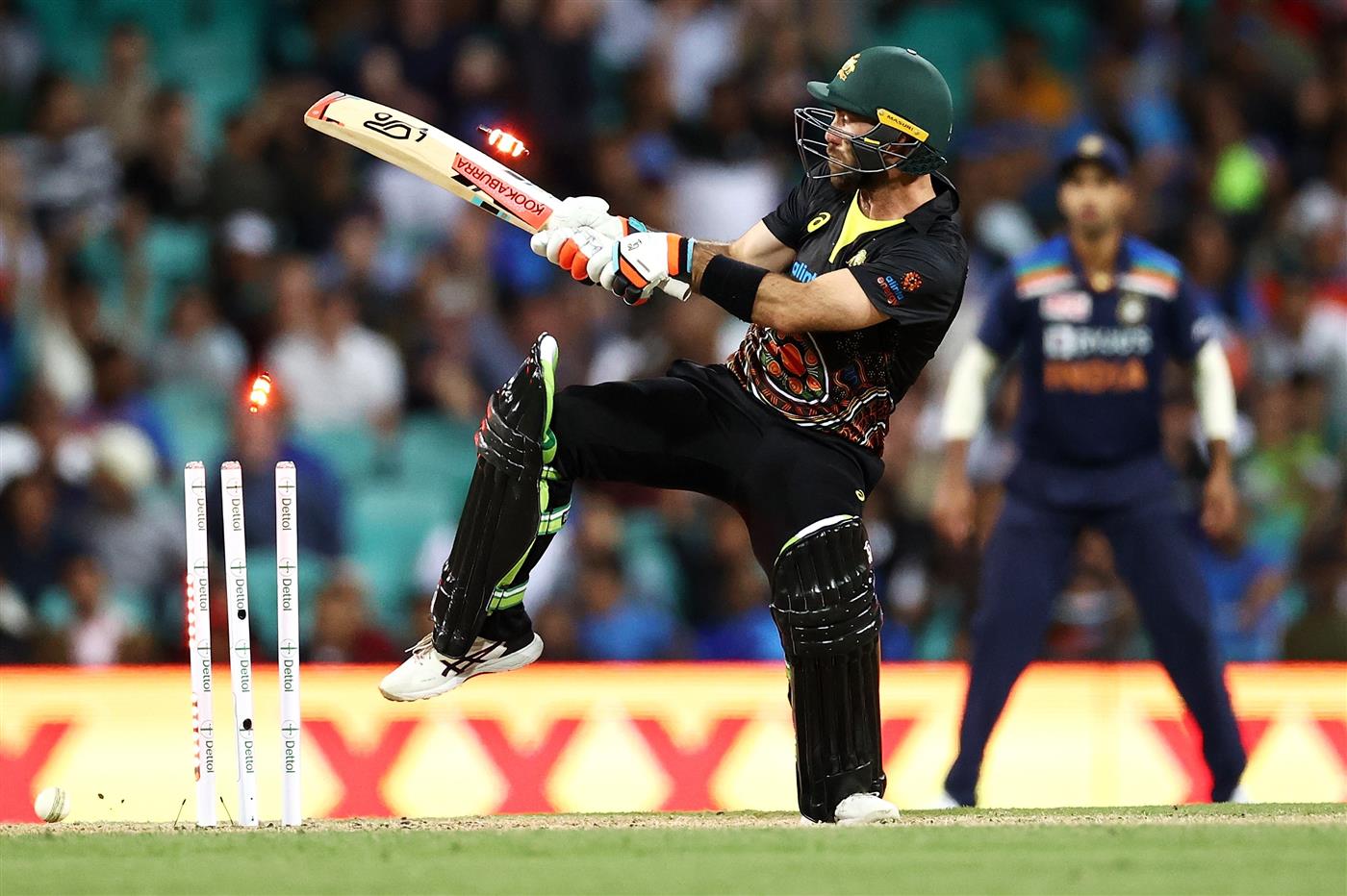 SYDNEY, AUSTRALIA - DECEMBER 08: Glenn Maxwell of Australia is dismissed by Thangarasu Natarajan of India during game three of the Twenty20 International series between Australia and India at Sydney Cricket Ground on December 08, 2020 in Sydney, Australia. (Photo by Cameron Spencer/Getty Images)
