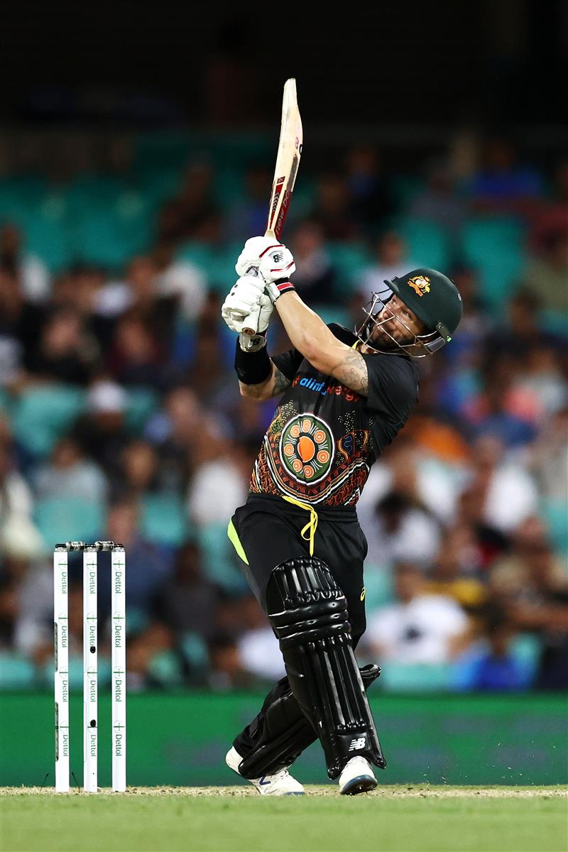 SYDNEY, AUSTRALIA - DECEMBER 08: Matthew Wade of Australia bats during game three of the Twenty20 International series between Australia and India at Sydney Cricket Ground on December 08, 2020 in Sydney, Australia. (Photo by Cameron Spencer/Getty Images)