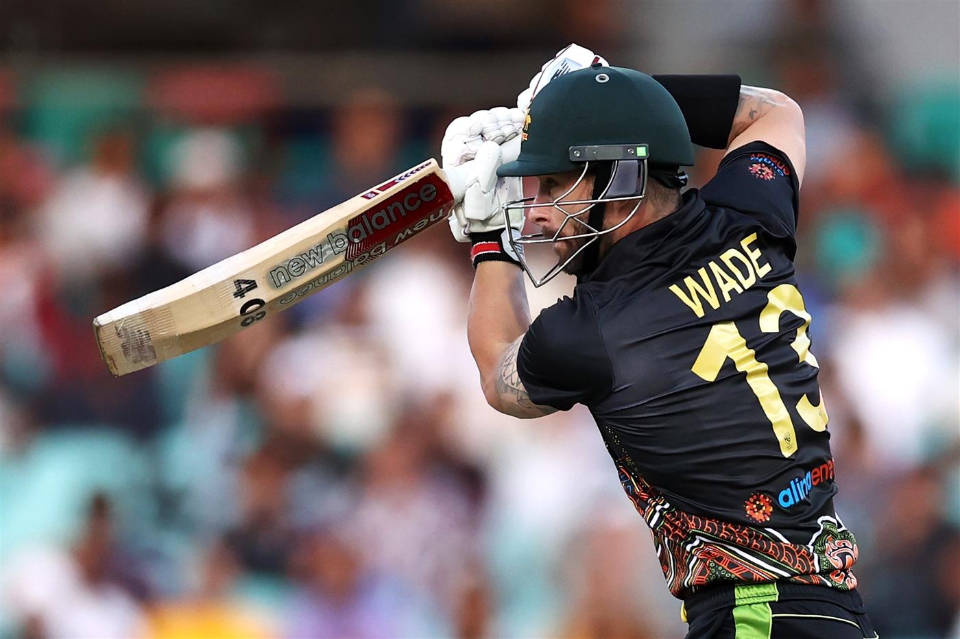 SYDNEY, AUSTRALIA - DECEMBER 08: Matthew Wade of Australia bats during game three of the Twenty20 International series between Australia and India at Sydney Cricket Ground on December 08, 2020 in Sydney, Australia. (Photo by Cameron Spencer/Getty Images)