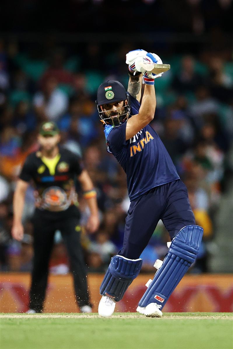 SYDNEY, AUSTRALIA - DECEMBER 08: Virat Kohli of India bats during game three of the Twenty20 International series between Australia and India at Sydney Cricket Ground on December 08, 2020 in Sydney, Australia. (Photo by Cameron Spencer/Getty Images)